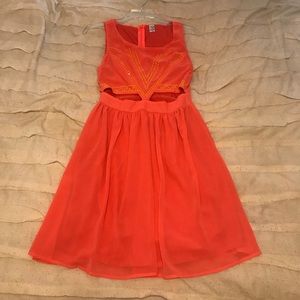 Coral dress with midriff cutouts & yellow beading